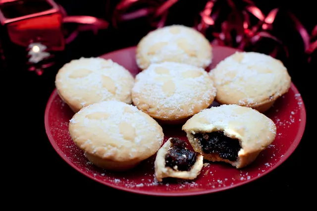 Mince pies on a red plate